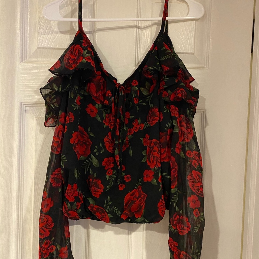 Red and black floral blouse